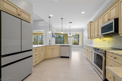Kitchen featuring appliances with stainless steel