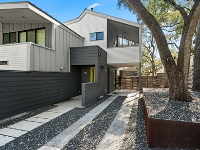 Contemporary house featuring board and batten sid