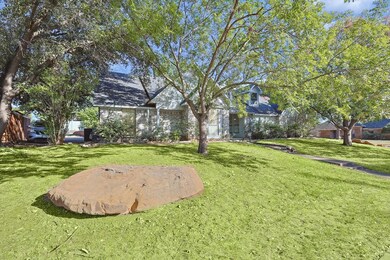 View of front of home featuring a front yard