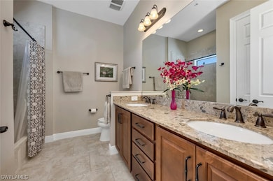 Guest bath with dual sinks.