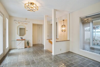 Spare room featuring baseboards, a notable chande