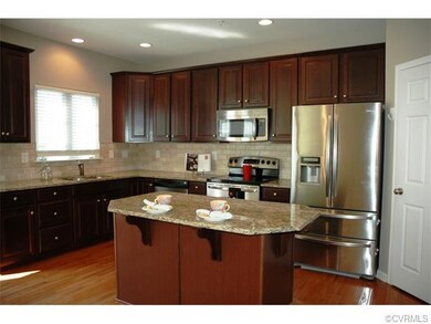 Kitchen with island, granite counter tops, stainle