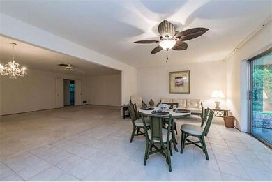Family room to living room and two guest bedrooms and bath