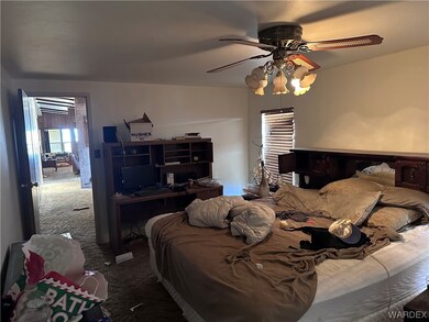 Bedroom featuring natural light, carpet, a ceiling