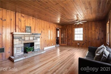 VINTAGE Pine-Paneled Walls. ORIGINAL Oak Floors. (FP NON-working) All brought back to their luster.