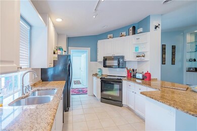 Granite, S/S Appliances and Reconfigured Cabinets 