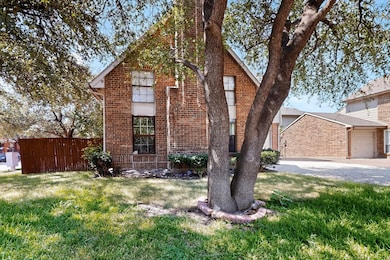 View of front of house featuring brick siding