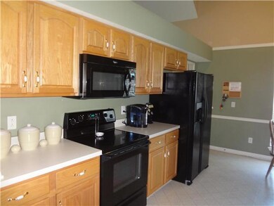 There is lots of cabinet space and just adjacent to this photo there is a large pantry/closet.  From the kitchen you can access the garage.