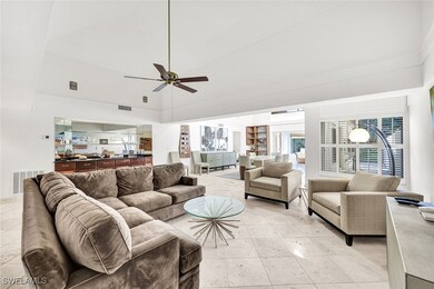 Living room with light tile patterned flooring, vi