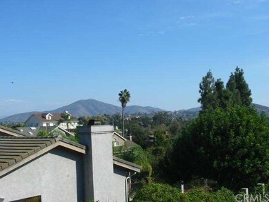 VIEW FROM THE TOP LEFT OF THE PROPERTY WITH MOUNTA