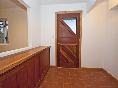 Entry/Foyer. Beautiful custom Redwood front door a