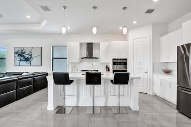 12855 Bayside Ct, Parkland, FL 33076 - photo 6