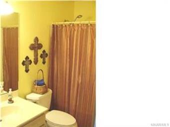 Bright and Cheery Hall Bath