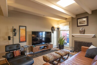 Cozy Fireplace and Skylights