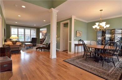 The sand-and-finish hardwood floors extend through