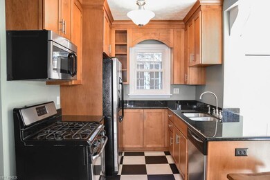 Remodeled kitchen with beautiful cabinetry.