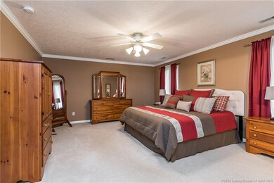 Large bedroom upstairs offers plenty of sunlight