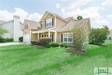 Home front with mature landscaping.