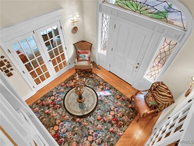 Front door with leaded glass windows sourced from