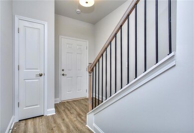 Entrance foyer featuring light hardwood / wood-sty