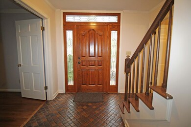 Foyer with ceramic tile floor
