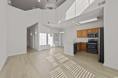 Kitchen with sink, stainless steel appliances, an 