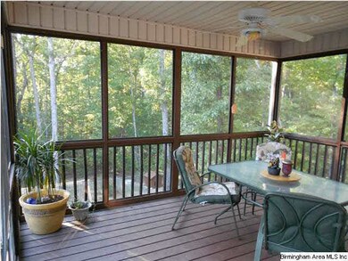 Nice covered screened in deck.