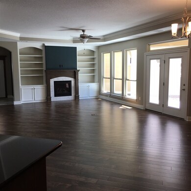 Open concept with living/dining/kitchen.