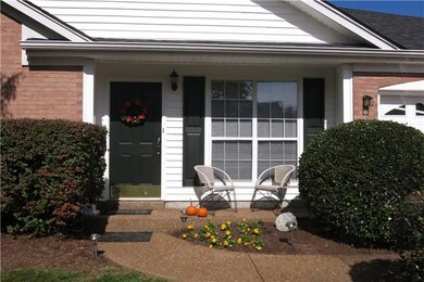 Mature Landscaping surrounds home and front porch. A curved, side walkway leading to the entry adds to the curb appeal of this adorable home.