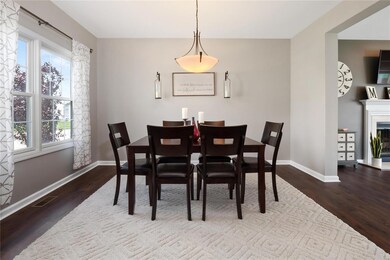 Spacious dining room features new vinyl flooring &