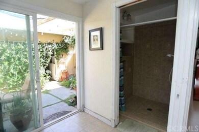 Downstairs shower room and entrance to the patio b