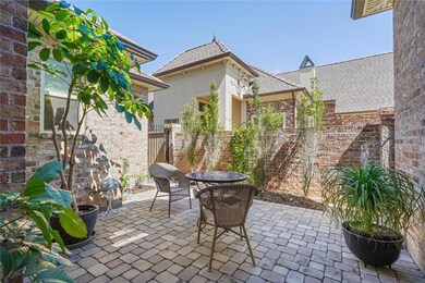 New Orleans style private side courtyard which pro