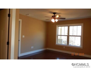 master bedroom with h/w floors