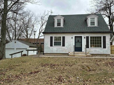 WITH DETACHED GARAGE
