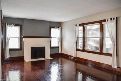 Gorgeous living room with gleaming hardwood floori
