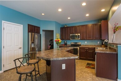 As we move into the kitchen, we see the sumptuous 