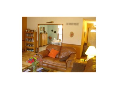GREAT RM WITH COZY FIREPLACE, WOOD FLOOR AND SLATE