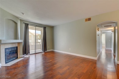 Unfurnished living room with wood finished floors,