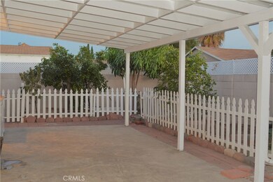 Back yard with fruit trees.