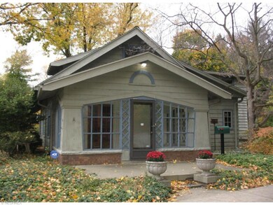 Entry through a lovely enclosed porch.