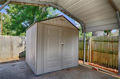 Storage building.  Carport reserved.