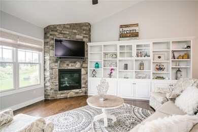 Stunning Custom Built Stone Fireplace & Bookcase