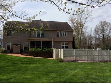 Exterior Back. Screened Porch and Fenced Pool over