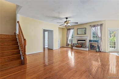 Unfurnished living room featuring light hardwood f