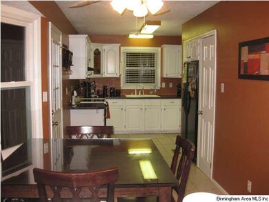 updated eat-in kitchen with bay window and access 