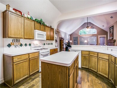 Kitchen looking toward Living Room/back of house.