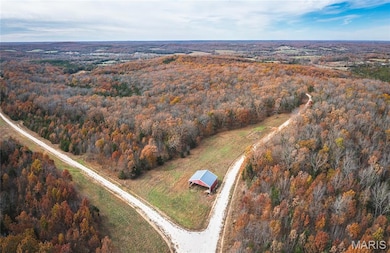 Aerial view of a heavily wooded area