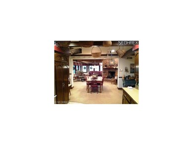 Open floor plan from kitchen through dining room t