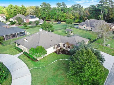 Aerial view showing the circle driveway, 3-car wid