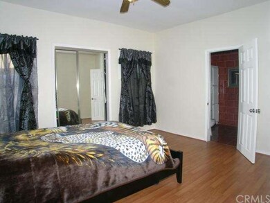 Large master suite with attached bathroom.
